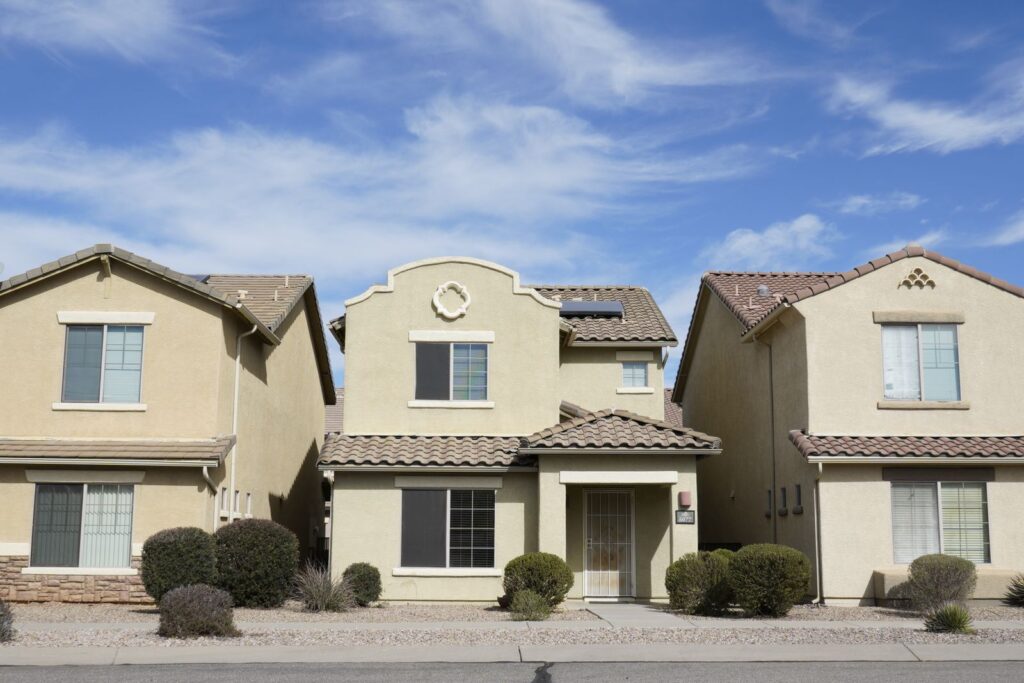 Houses in Tucson with gravel front yards and desert shrubs